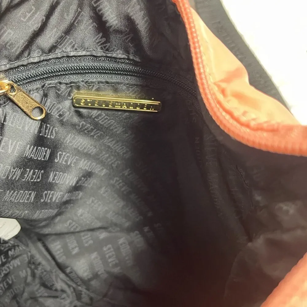 Steve Madden peach quilted nylon front zipper pocket shoulder/crossbody bag.